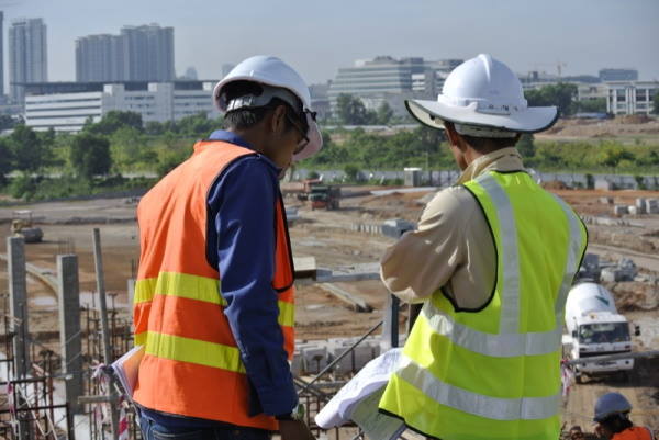 Construction workers, workers' compensation concept image